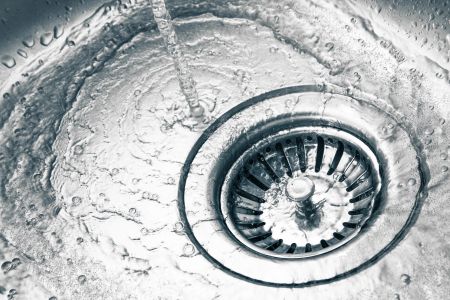 What should you do when a drain keeps clogging repeatedly